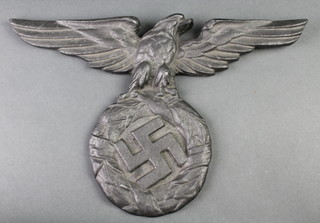 A large facsimile cast metal eagle plaque with Swastika 14"
