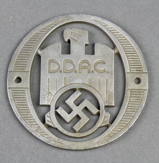 A pierced aluminium radiator badge marked DDAC 3 1/2" 
