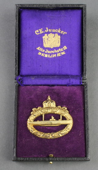 A U Boat style badge, the reverse marked CEI, cased 