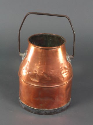 A circular copper churn with iron swing handles 15" 