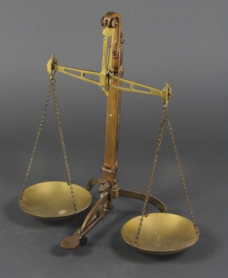 J Hare, a pair of brass scales 