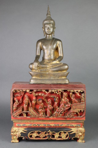 A Chinese bronze figure of a seated Buddha 14"h, raised on a 2 section carved gilt wood associated stand 
