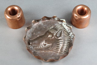 A pair of circular 19th Century copper ice cream/jelly moulds 2" and a circular embossed brass dish decorated a boars head 6" 