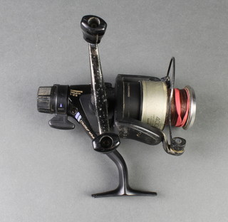 A Shimano 4000 GMT double handled match reel and 2 spare spools