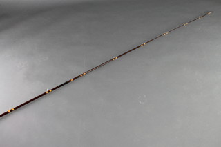 A Hardys carbon fibre 14' Matchmaker 3 section fishing rod complete with slip