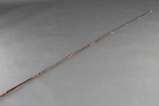 A Milbor 12' 3 section carbon fibre salmon fishing rod complete with sleeve