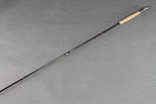 A Bob Church Peter Cockwil small fisheries 9'6" twin section carbon fibre fishing rod 