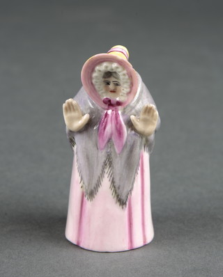 A Royal Worcester candle snuffer in the form of an elderly lady wearing a bonnet 3" 