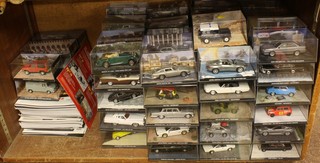110 various James Bond 007 Car Collection model cars together with magazines relating 