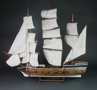 A wooden mode of The Mayflower 19" (2 cannons damaged) together with a wooden model of a 3 masted sailing ship 34" 