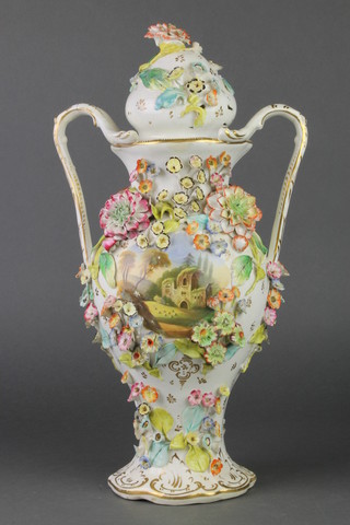 A 19th Century Coalbrookdale style 2 handled oviform vase decorated with panels of buildings encrusted with flowers 17" 