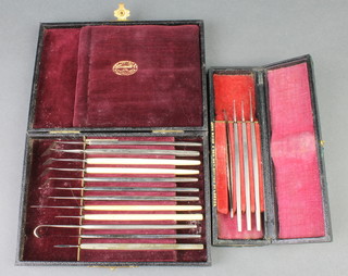 Weiss of London, a cased set of medical instruments and 1 other cased set of medical instruments 
