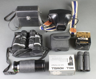 n Olympus CM10 camera with Olympus Auto - 3 50mm1:1/8 lens, together with 4 pairs of binoculars etc 