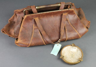 Frankie Howerd, Frankie Howerd's leather "joke bag", a doctors/Gladstone type bag.  This bag was used by Frankie Howerd on a regular basis to hold pieces of paper on which were written jokes, he took to venues and dipped into on an impromptu basis during the performance, also sold with a circular gilt metal butterfly ash tray taken as a travelling companion on his tours, together with a Dreweatt Neate catalogue of the Frankie Howerd sale 