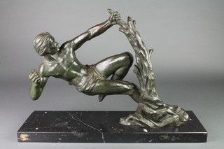 An Art Deco bronze figure of a semi-naked man, raised on a rectangular marble base 16"h x 22"w x 7"d 