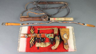 A whip together with a collection of various native Indian reproduction curios etc 