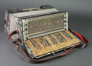 A German Bonelli accordion with 20 buttons, cased 