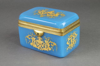 A 19th Century turquoise glass gilt decorated, rounded rectangular trinket box with gilt metal mounts 5 1/2" 