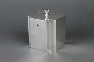 A George III silver square tea caddy with inverted corners and urn finial, having a chased armorial.  London 1772, 354 grams