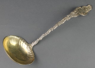 A Sterling silver ladle with fancy scroll handle, 200 grams