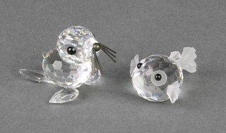 A Swarovski puffer fish 1" and a seal 1", boxed 