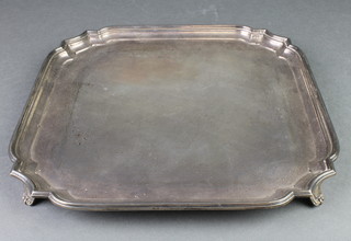 A silver salver of square form with canted corners, Sheffield 1946 1054 grams 