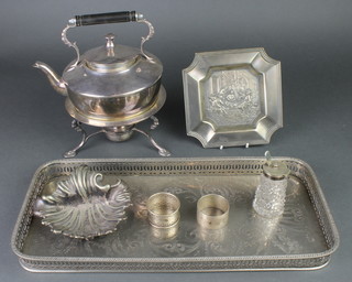 A silver plated tea kettle on stand and minor plated items