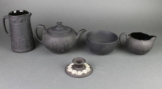 A Wedgwood black basalt teapot decorated with classical figures 8", a ditto bowl, candlestick and 2 jugs 