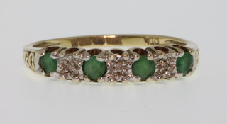 A 9ct gold gem set ring, size M 