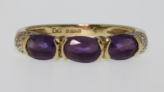 A 9ct gold amethyst and diamond ring size K 1/2