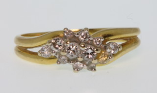 An 18ct yellow gold diamond ring, size I 1/2