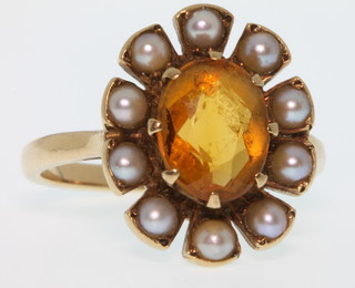 A 9ct gold topaz and seed pearl dress ring size M 1/2