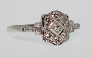 An 18ct white gold Art Deco style diamond ring, approx. 0.4ct, size L 1/2