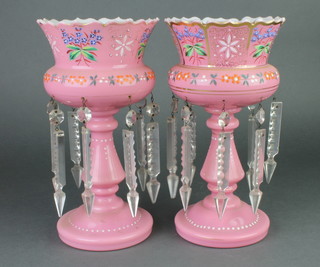 A pair of Victorian painted pink glass baluster lustres with faceted drops 10" 