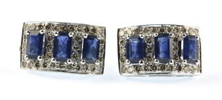 A pair of 18ct white gold Art Deco style sapphire and diamond ear clips 