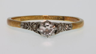An 18ct yellow gold single stone diamond ring, size P