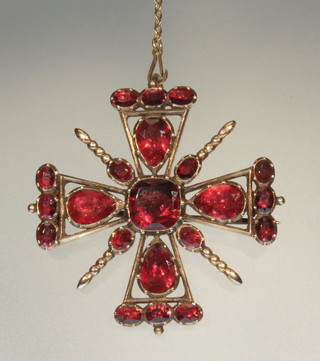 A Victorian gold and garnet cross brooch/pendant