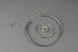 A silver rope twist necklace, a ditto bangle and ring together with a free form necklace