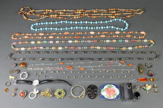 A quantity of bead necklaces and a guilloche enamel buckle 