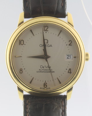 A gentleman's 18ct gold Omega Deville automatic chronometer calendar wristwatch on a black leather strap
