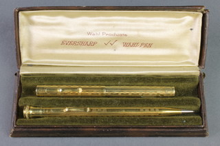 A gilt Eversharp fountain pen and propelling pencil, boxed