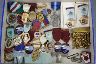 A collection of gilt and enamel Masonic jewels