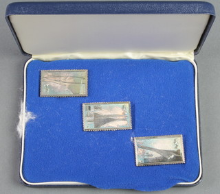 A cased set of 3 silver Concord stamps, 48 grams