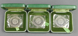 3 cased silver 1972 commemorative crowns, 84 grams