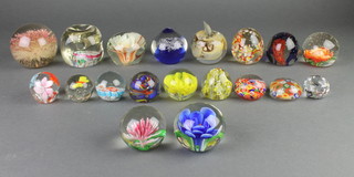 A collection of modern glass paperweights 