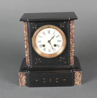 A Victorian 8 day striking mantel clock with enamelled dial and Roman numerals contained in a 2 colour marble architectural case 