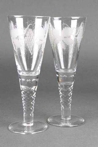 A pair of mammoth engraved tapered wines with vinous decoration and faceted stems 11" 