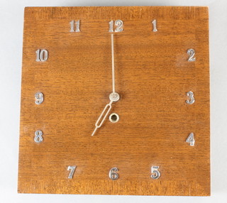 An Art Deco battery operated wall clock, the square dial with Arabic numerals 10" x 10" 
