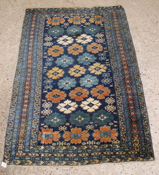 A blue ground Caucasian style rug within 5 borders 54"h x 37" 