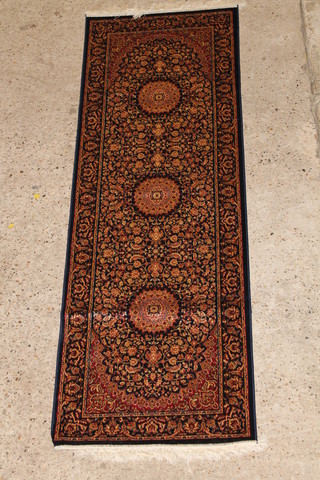 A Belgian cotton blue ground Persian style runner, having 3 medallions to the centre 83 1/2" x 27 1/2" 